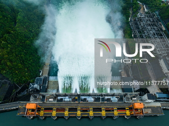 Flood discharge is happening from the Xin 'an River Dam in Hangzhou, China, on June 26, 2024. (