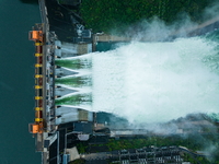 Flood discharge is happening from the Xin 'an River Dam in Hangzhou, China, on June 26, 2024. (