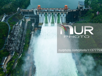 Flood discharge is happening from the Xin 'an River Dam in Hangzhou, China, on June 26, 2024. (