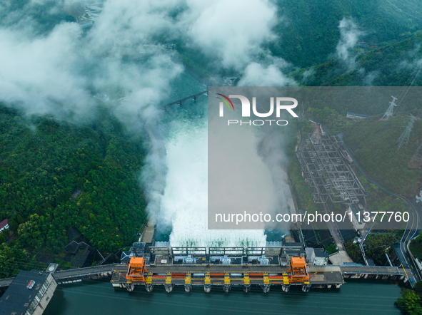 Flood discharge is happening from the Xin 'an River Dam in Hangzhou, China, on June 26, 2024. 