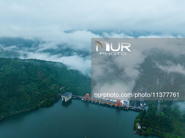 Flood discharge is happening from the Xin 'an River Dam in Hangzhou, China, on June 26, 2024. 