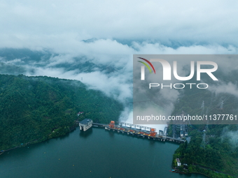 Flood discharge is happening from the Xin 'an River Dam in Hangzhou, China, on June 26, 2024. (