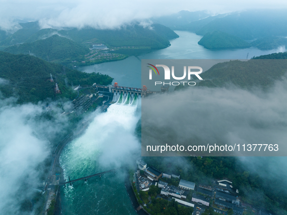 Flood discharge is happening from the Xin 'an River Dam in Hangzhou, China, on June 26, 2024. 