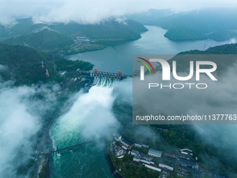 Flood discharge is happening from the Xin 'an River Dam in Hangzhou, China, on June 26, 2024. (