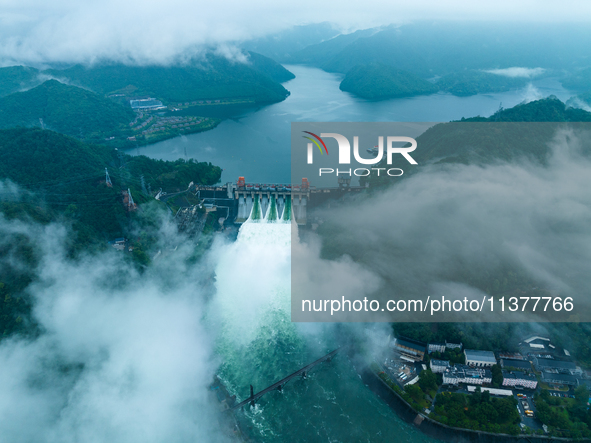 Flood discharge is happening from the Xin 'an River Dam in Hangzhou, China, on June 26, 2024. 