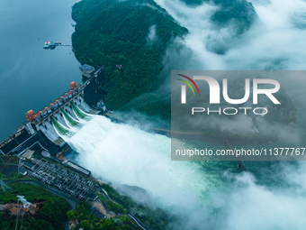 Flood discharge is happening from the Xin 'an River Dam in Hangzhou, China, on June 26, 2024. (