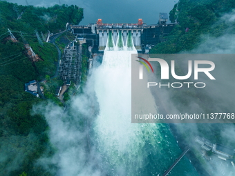 Flood discharge is happening from the Xin 'an River Dam in Hangzhou, China, on June 26, 2024. (