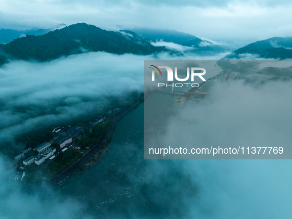 Flood discharge is happening from the Xin 'an River Dam in Hangzhou, China, on June 26, 2024. 