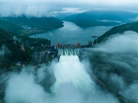 Flood discharge is happening from the Xin 'an River Dam in Hangzhou, China, on June 26, 2024. (