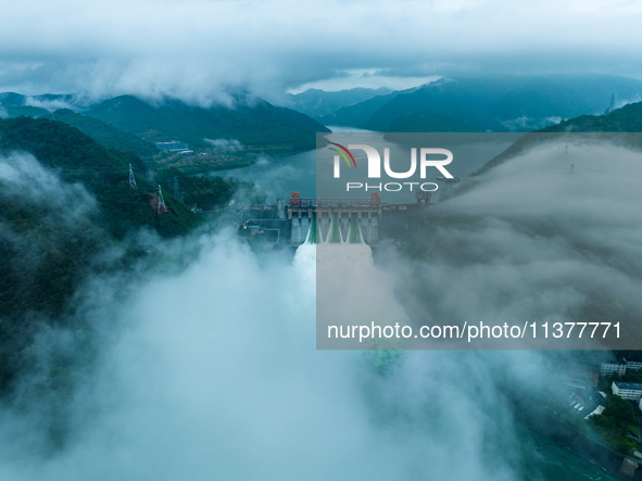 Flood discharge is happening from the Xin 'an River Dam in Hangzhou, China, on June 26, 2024. 