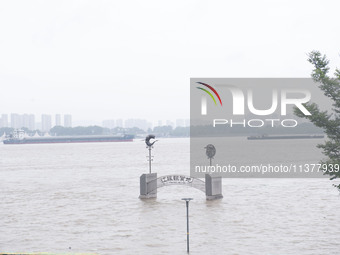 Water levels in the Nanjing section of the Yangtze River are rising above the warning line in Nanjing, Jiangsu province, China, on July 2, 2...