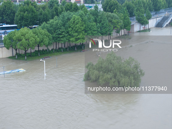 Water levels in the Nanjing section of the Yangtze River are rising above the warning line in Nanjing, Jiangsu province, China, on July 2, 2...