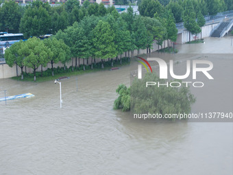 Water levels in the Nanjing section of the Yangtze River are rising above the warning line in Nanjing, Jiangsu province, China, on July 2, 2...