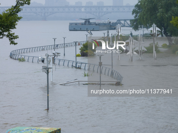 Water levels in the Nanjing section of the Yangtze River are rising above the warning line in Nanjing, Jiangsu province, China, on July 2, 2...