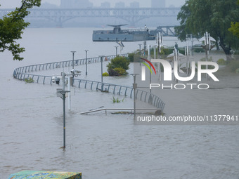 Water levels in the Nanjing section of the Yangtze River are rising above the warning line in Nanjing, Jiangsu province, China, on July 2, 2...