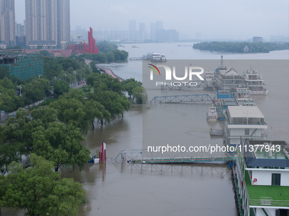 Water levels in the Nanjing section of the Yangtze River are rising above the warning line in Nanjing, Jiangsu province, China, on July 2, 2...