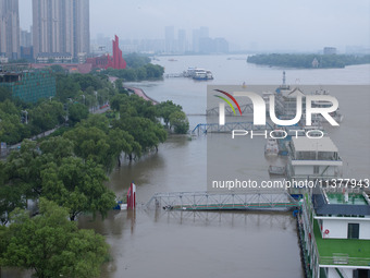 Water levels in the Nanjing section of the Yangtze River are rising above the warning line in Nanjing, Jiangsu province, China, on July 2, 2...