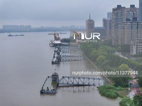 Water levels in the Nanjing section of the Yangtze River are rising above the warning line in Nanjing, Jiangsu province, China, on July 2, 2...