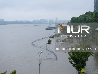 Water levels in the Nanjing section of the Yangtze River are rising above the warning line in Nanjing, Jiangsu province, China, on July 2, 2...