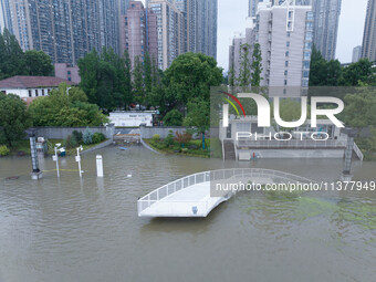 Water levels in the Nanjing section of the Yangtze River are rising above the warning line in Nanjing, Jiangsu province, China, on July 2, 2...