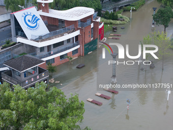 Water levels in the Nanjing section of the Yangtze River are rising above the warning line in Nanjing, Jiangsu province, China, on July 2, 2...