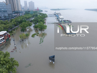 Water levels in the Nanjing section of the Yangtze River are rising above the warning line in Nanjing, Jiangsu province, China, on July 2, 2...