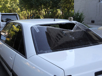 The rear window of a car is being smashed by a recent Russian missile attack in Dnipro, Ukraine, on July 1, 2024. Russia is launching a miss...