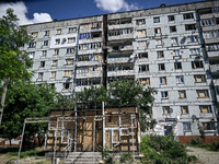 A damaged apartment block is being pictured in the rural settlement of Stepnohirsk, Ukraine, on June 28, 2024, that is being shelled daily b...