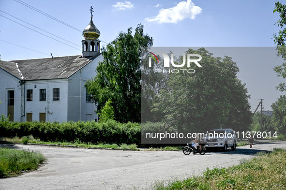 Locals are being seen in the street in the rural settlement of Stepnohirsk that is being shelled daily by Russian troops as the team of Zapo...