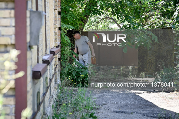 A local man is being pictured in the rural settlement of Stepnohirsk, Ukraine, on June 28, 2024, which is being shelled daily by Russian tro...