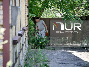 A local man is being pictured in the rural settlement of Stepnohirsk, Ukraine, on June 28, 2024, which is being shelled daily by Russian tro...