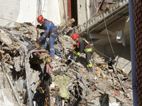 Rescuers are removing the rubble at the apartment block hit by a Russian missile in Dnipro, Ukraine, on June 30, 2024. NO USE RUSSIA. NO USE...