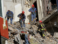 Rescuers are removing the rubble at the apartment block hit by a Russian missile in Dnipro, Ukraine, on June 30, 2024. NO USE RUSSIA. NO USE...