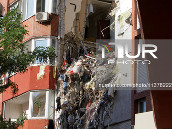 The apartment block hit by a Russian missile on June 28 is being seen during a response effort in Dnipro, Ukraine, on June 30, 2024. NO USE...