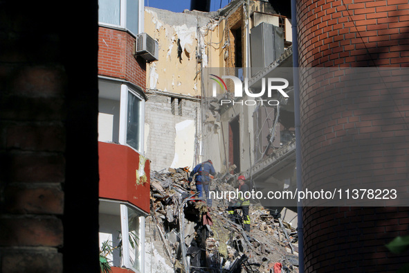 Rescuers are removing the rubble at the apartment block hit by a Russian missile in Dnipro, Ukraine, on June 30, 2024. NO USE RUSSIA. NO USE...