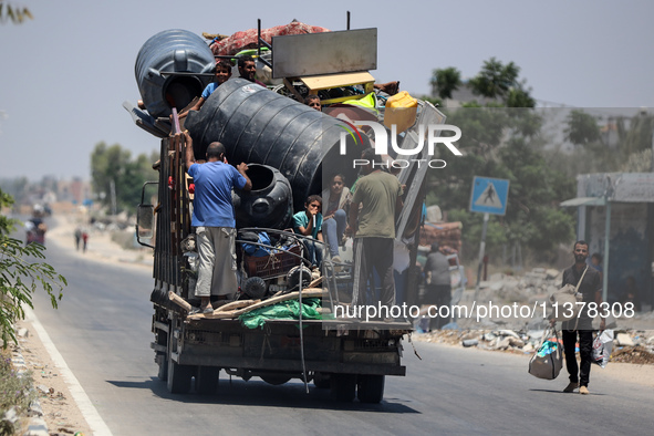 Displaced Palestinians are leaving an area in east Khan Yunis after the Israeli army issues a new evacuation order for parts of the city and...