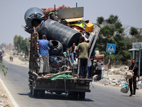 Displaced Palestinians are leaving an area in east Khan Yunis after the Israeli army issues a new evacuation order for parts of the city and...