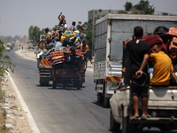 Displaced Palestinians are leaving an area in east Khan Yunis after the Israeli army issues a new evacuation order for parts of the city and...