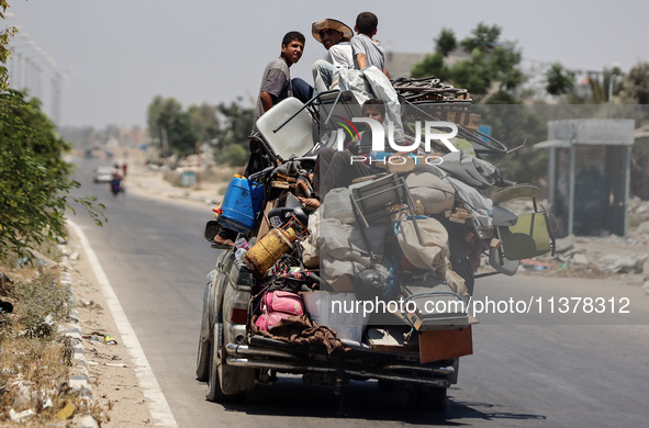 Displaced Palestinians are leaving an area in east Khan Yunis after the Israeli army issues a new evacuation order for parts of the city and...