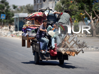 Displaced Palestinians are leaving an area in east Khan Yunis after the Israeli army issues a new evacuation order for parts of the city and...