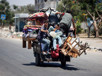 Displaced Palestinians are leaving an area in east Khan Yunis after the Israeli army issues a new evacuation order for parts of the city and...