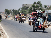 Displaced Palestinians are leaving an area in east Khan Yunis after the Israeli army issues a new evacuation order for parts of the city and...