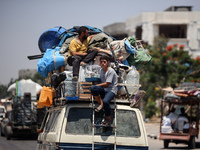 Displaced Palestinians are leaving an area in east Khan Yunis after the Israeli army issues a new evacuation order for parts of the city and...