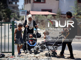 Displaced Palestinians are leaving an area in east Khan Yunis after the Israeli army issues a new evacuation order for parts of the city and...