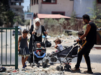 Displaced Palestinians are leaving an area in east Khan Yunis after the Israeli army issues a new evacuation order for parts of the city and...