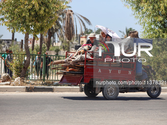 Displaced Palestinians are leaving an area in east Khan Yunis after the Israeli army issues a new evacuation order for parts of the city and...