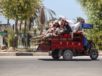 Displaced Palestinians are leaving an area in east Khan Yunis after the Israeli army issues a new evacuation order for parts of the city and...