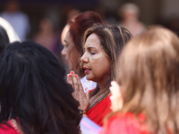 Hindu devotees are offering prayers during a pooja and grand abhishekam to celebrate the 8th anniversary of the installation of the 50-foot...