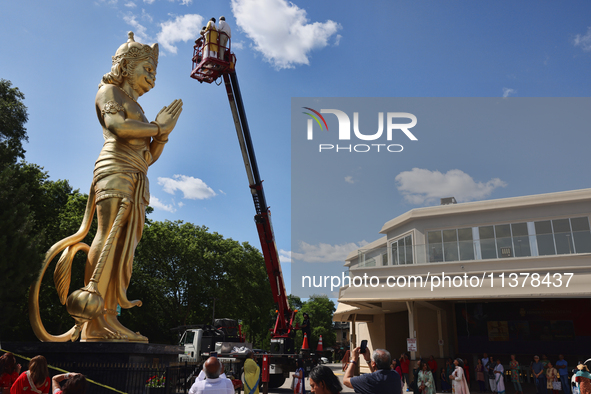 Pooja and grand abhishekam are celebrating the 8th anniversary of the installation of the 50-foot tall statue of Lord Hanuman at the Vishnu...