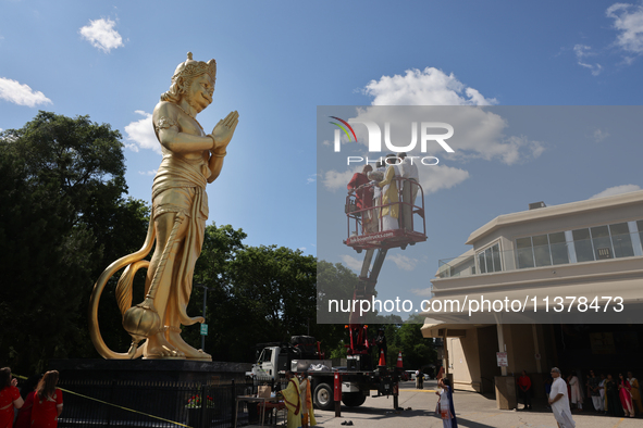 Pooja and grand abhishekam are celebrating the 8th anniversary of the installation of the 50-foot tall statue of Lord Hanuman at the Vishnu...